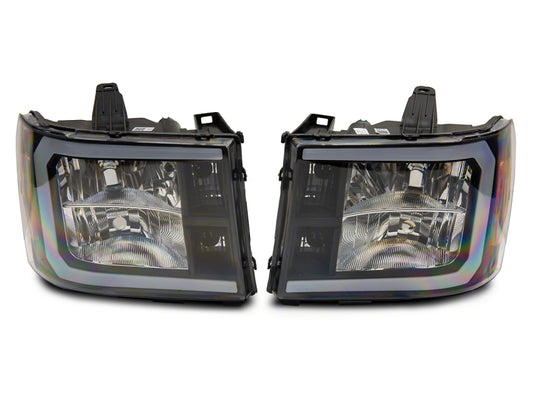 Raxiom 07-13 GMC Sierra 1500 Axial Series Headlights w/ LED Bar- Black Housing (Clear Lens)