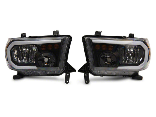Raxiom 07-13 Toyota Tundra Axial Series Headlights w/ LED Bar- Black Housing (Clear Lens)